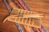 Double slotted rigid heddle with 11 pattern strings - Harvest Looms