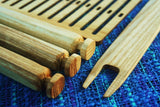 up close of backstrap loom kit with rigid heddle loom bars and hardwood shuttle