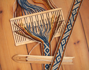 11 pattern strings double slotted loom, backstrap loom, patterned sashes, patterned belt, band weaving, baltic weaving, sami loom, small loom, portable loom, weaving desisgns